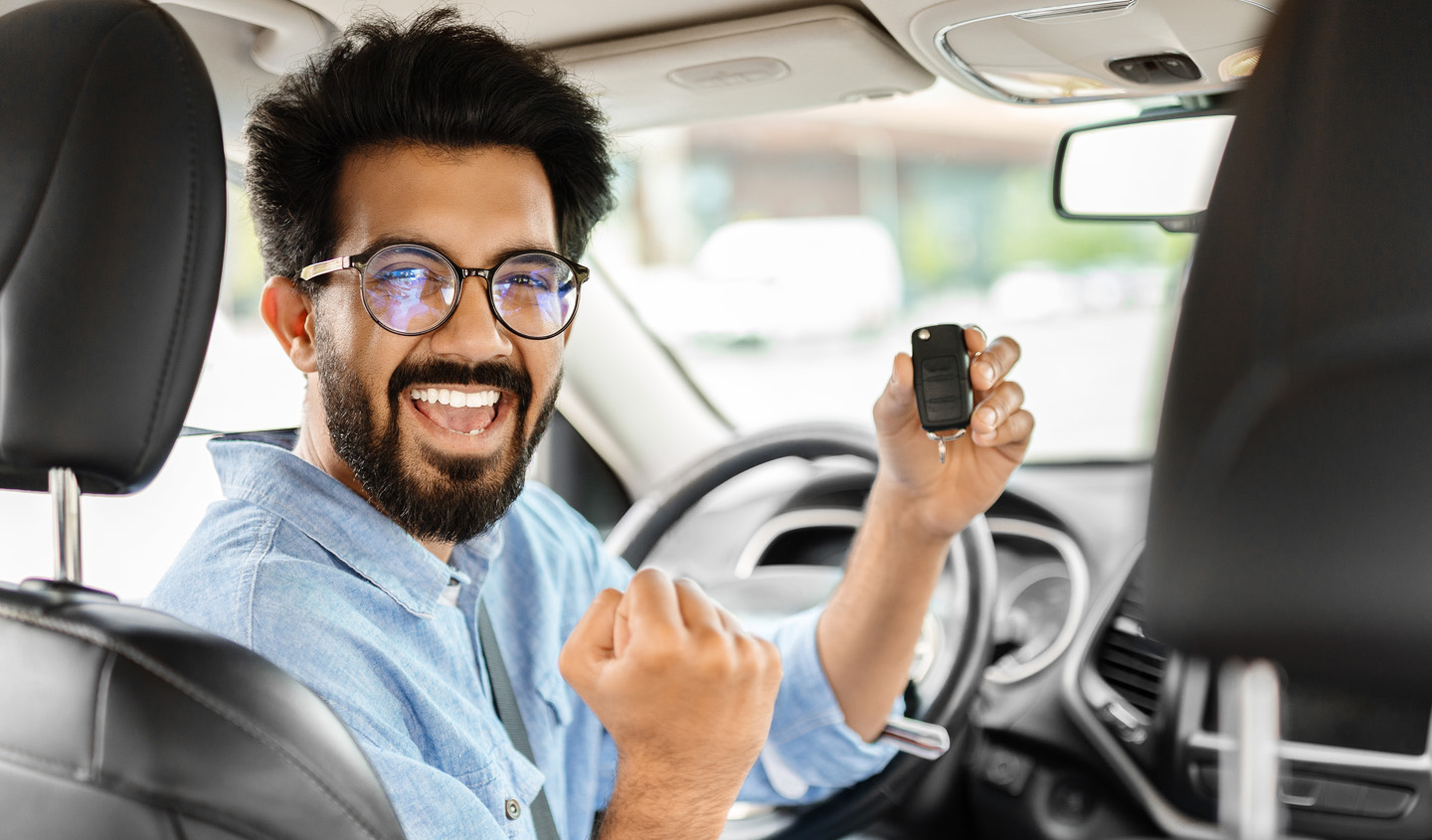 Customer excited about his vehicle purchase